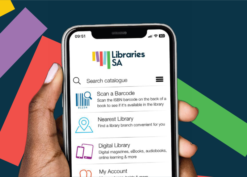 A hand holding a mobile phone with the LibrariesSA app displayed